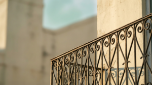 Wrought iron balcony railing in New Orleans, the header image for Courant's 90-day cybersecurity roadmap for small businesses